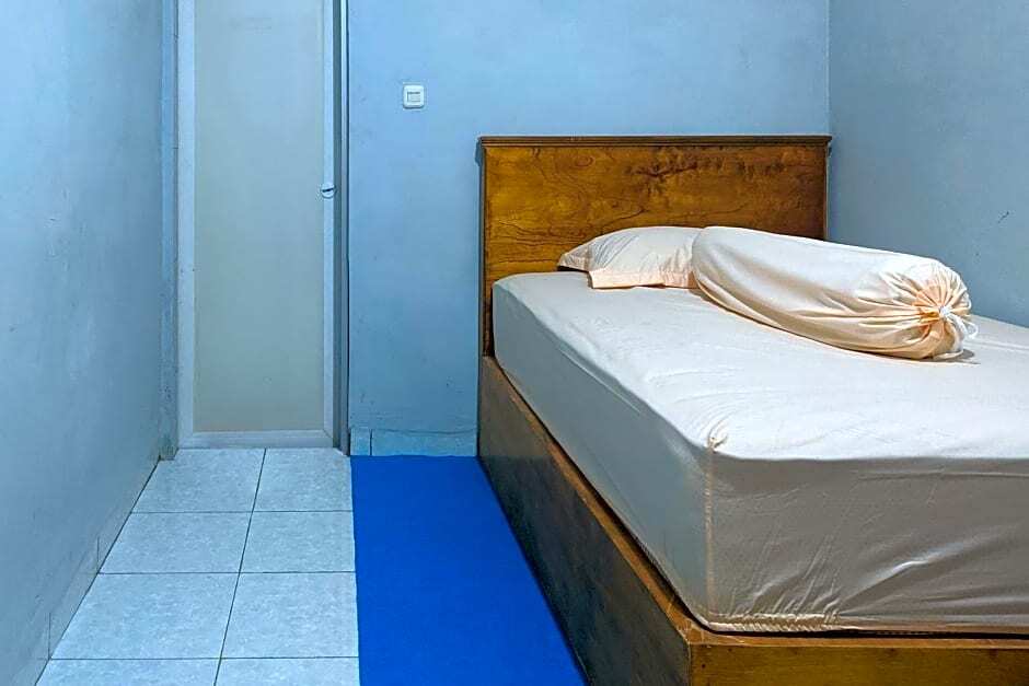Медан: OYO 90119 Dorowati Guesthouse Syariah