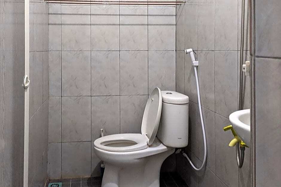 Медан: OYO 90119 Dorowati Guesthouse Syariah