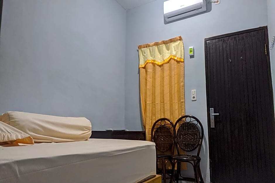 Медан: OYO 90119 Dorowati Guesthouse Syariah