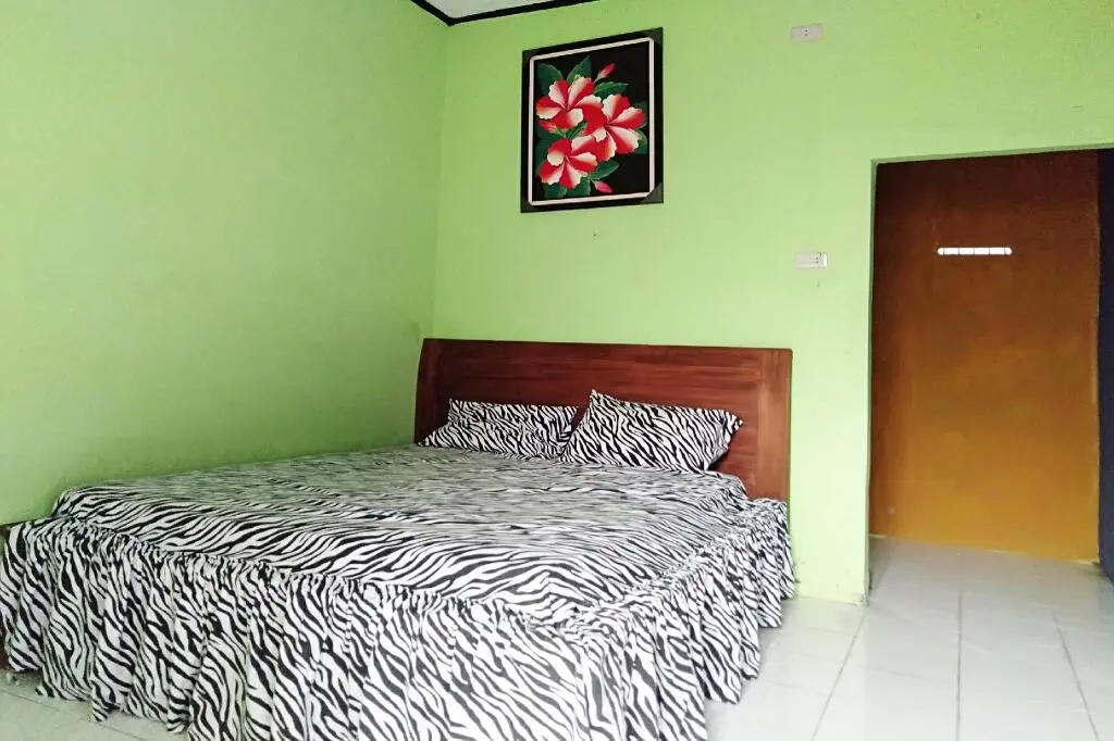 Мерак Белантунг: OYO 90229 Fidel Caestro Homestay