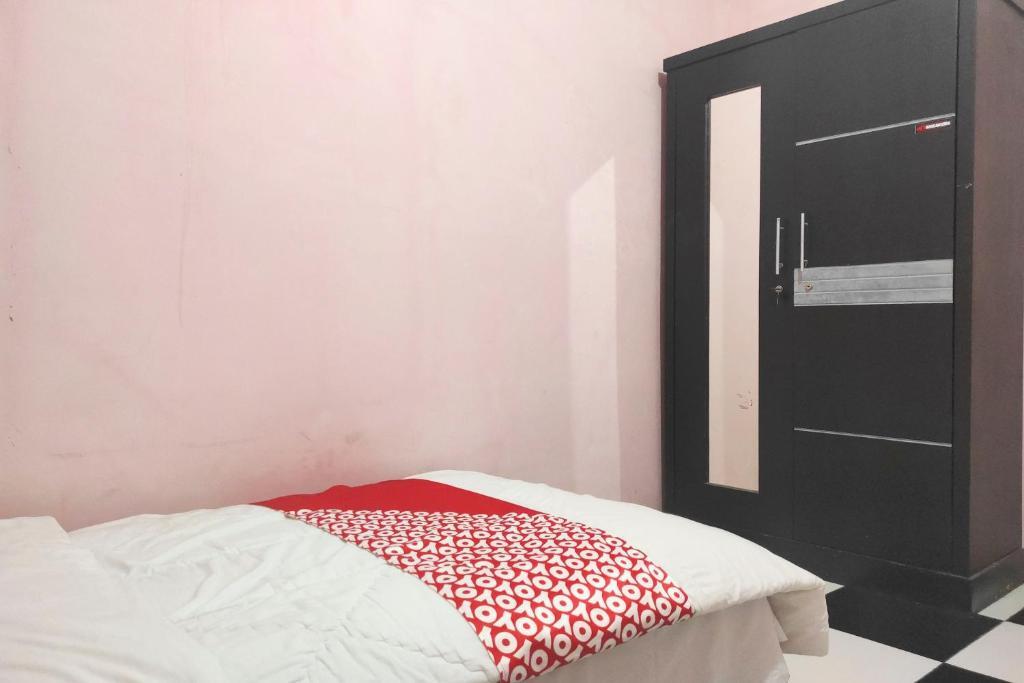 Депок: Oyo 90323 Wisma Puspita Syariah