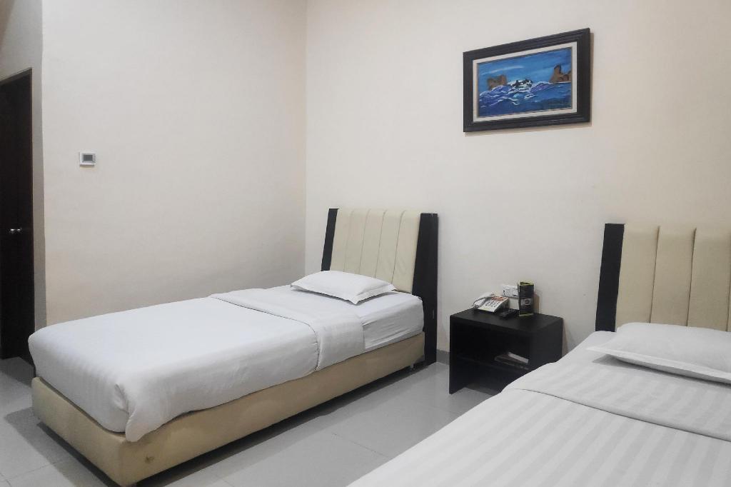 Медан: Capital O 90050 Raz Hotel And Convention Syariah