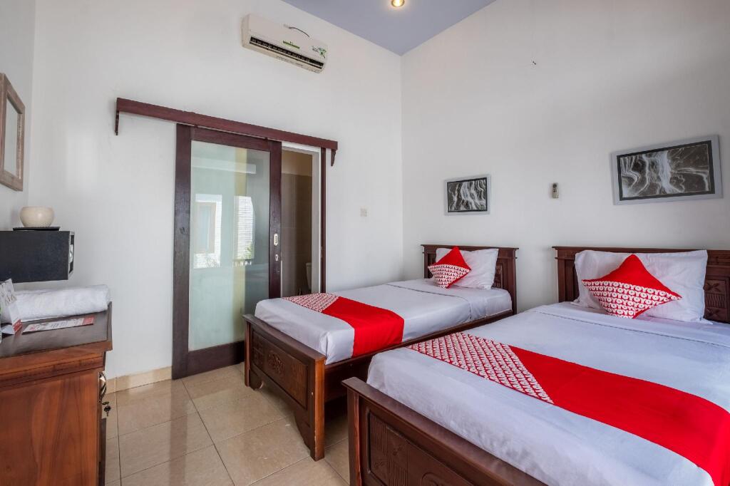 Пекутатан: OYO 915 Villa Sari