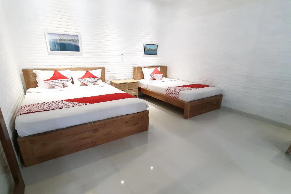 Пекутатан: OYO 915 Villa Sari
