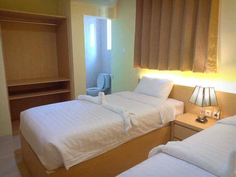 Маумере: Merlin Hotel