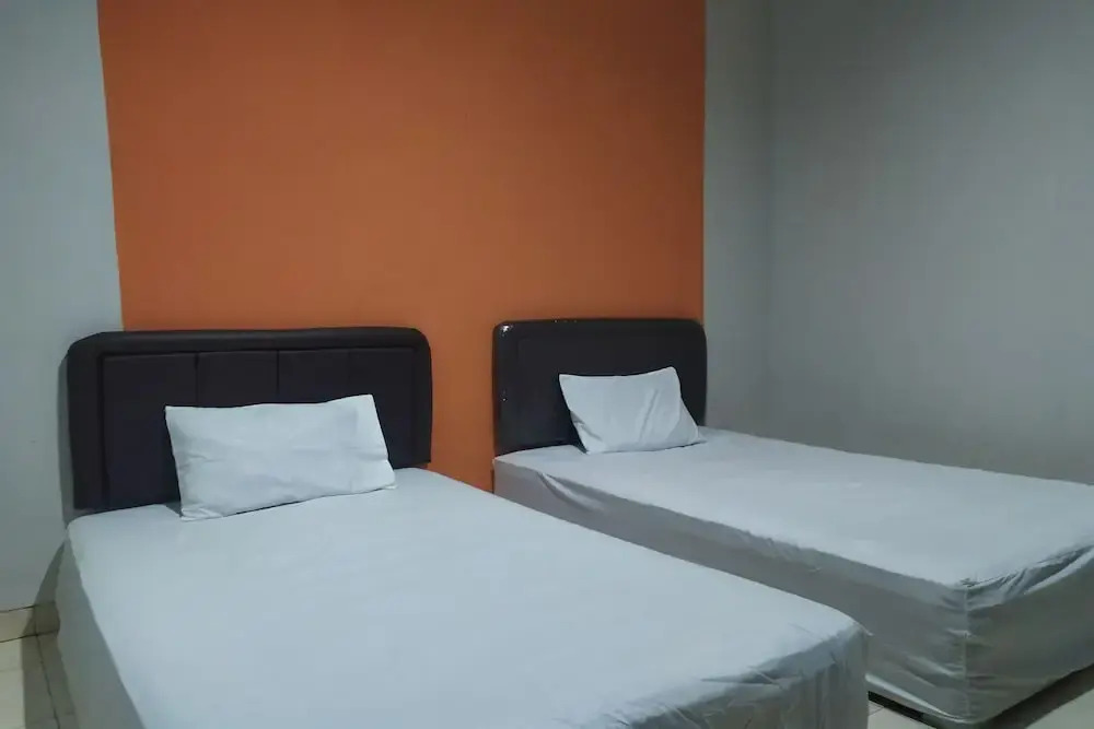 Джакарта: OYO 2654 Yulia Guesthouse Near Kopi Bajawa Flores NTT Tebet