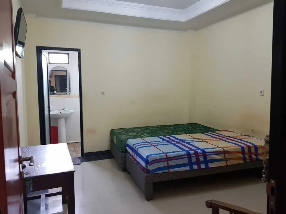 Депок: Oyo 2832 Wisma Sukatani Indah