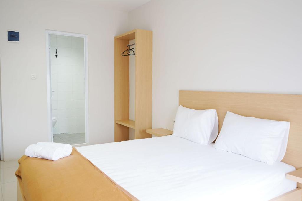 Джакарта: UROOMS Senayan