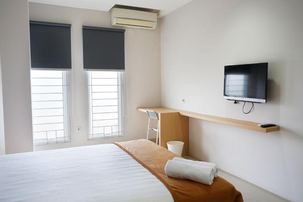 Джакарта: UROOMS Senayan