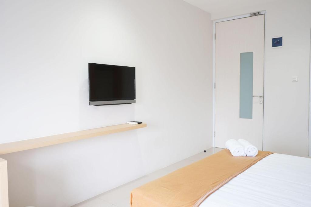 Джакарта: UROOMS Senayan