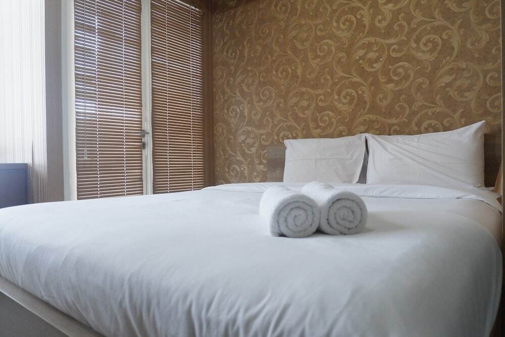 Сурабая: Cozy and Minimalist Studio Apartment at Tamansari Papilio By Travelio