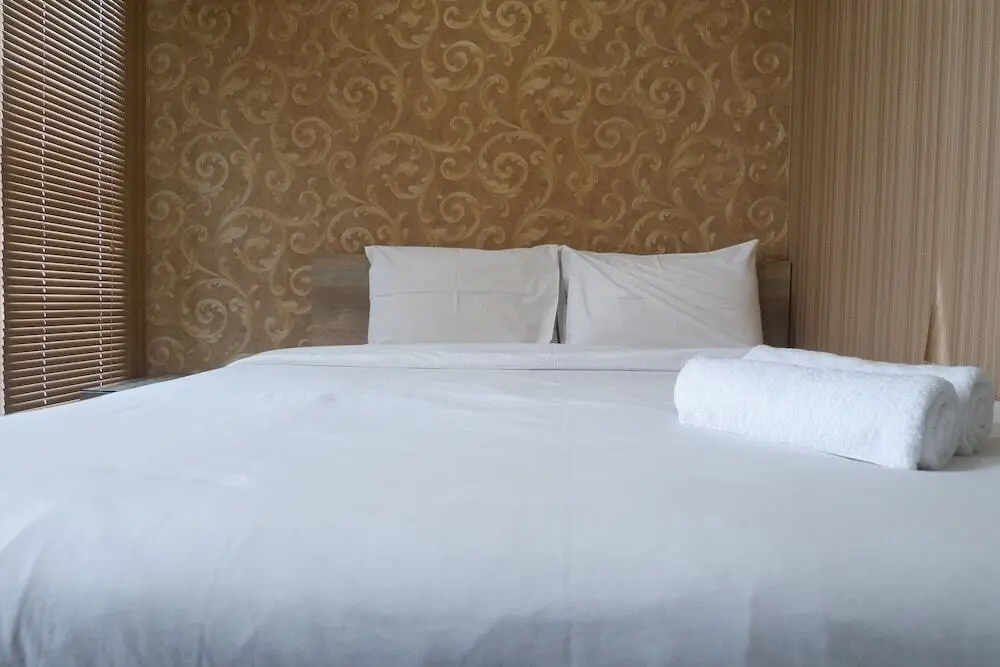 Сурабая: Cozy and Minimalist Studio Apartment at Tamansari Papilio By Travelio