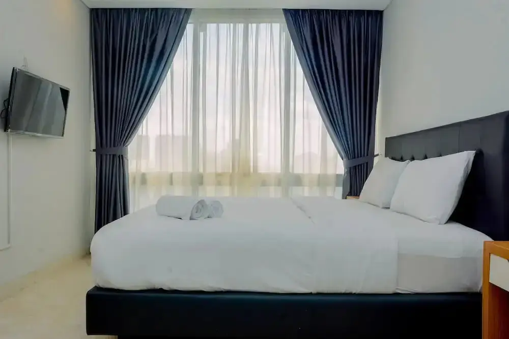 Comfy and Spacious 2BR The Masterpiece Epicentrum Apartment By Travelio — фото 1