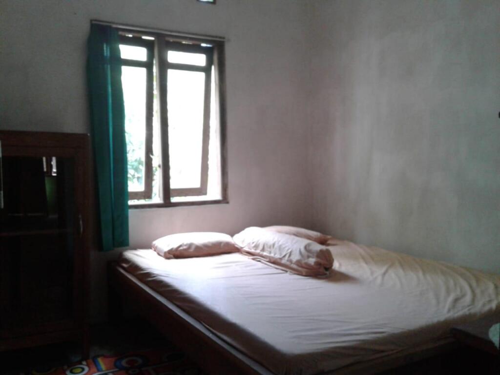 Харготирто: Sukarman Homestay