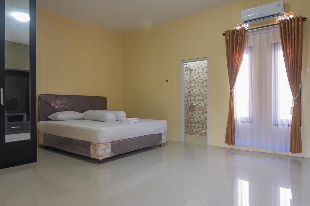 Барос: Aziz Guest House Syariah