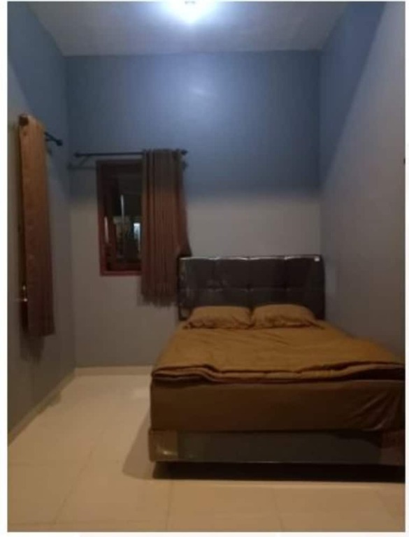 Бату: Deandels De Homestay