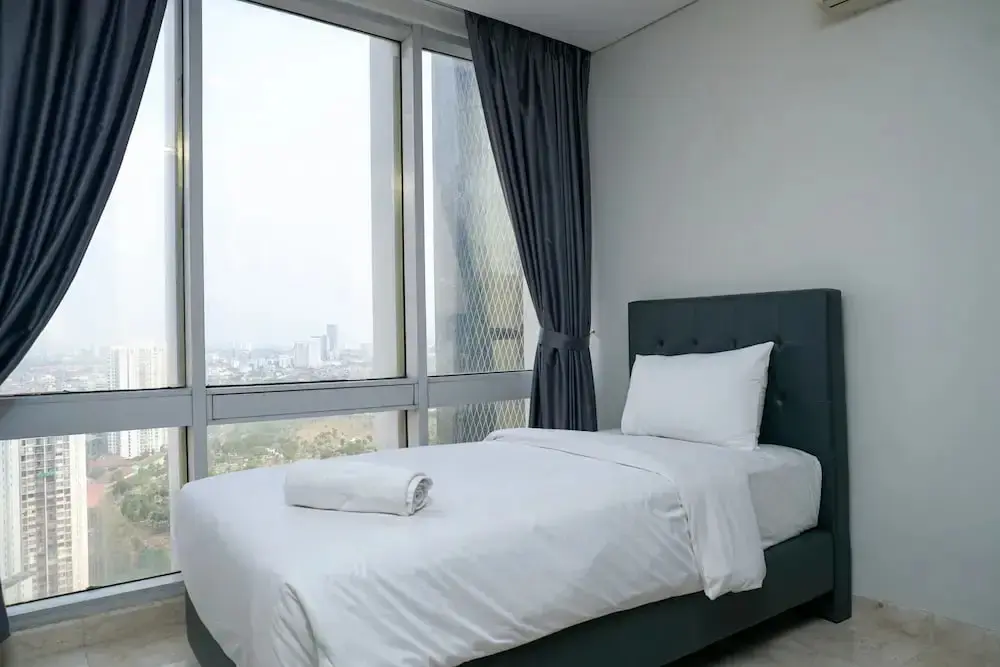 Джакарта: Modern and Comfortable 2BR at The Empyreal Condominium Epicentrum Apartment