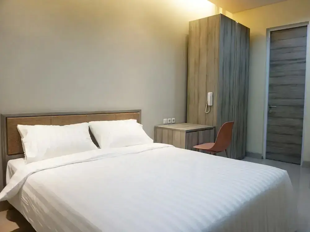 Суракарта: Djuragan Kamar Priority Inn
