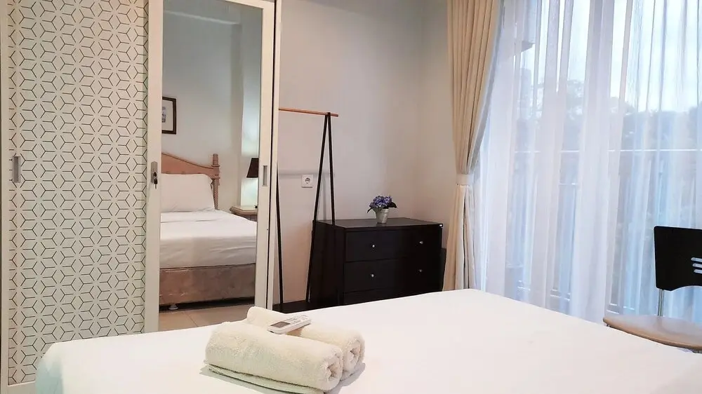 Бандунг: Bright & Trendy 1BR Dago Suites Apartment near ITB
