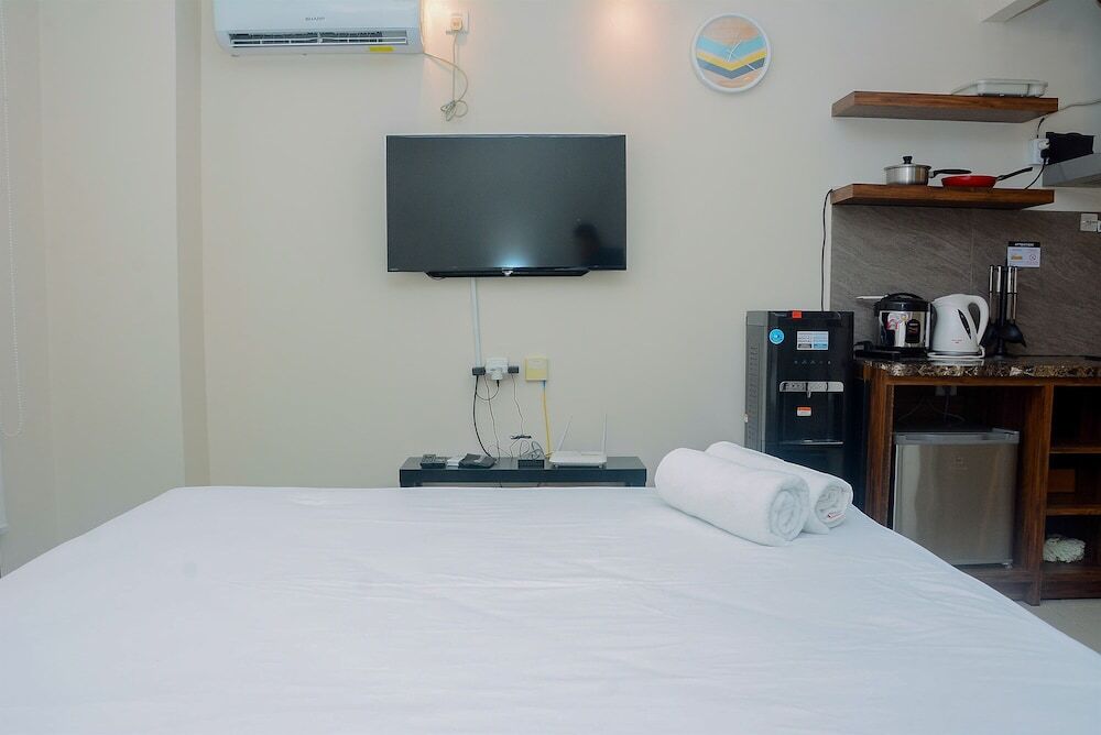Джакарта: Comfy and Minimalist Studio Kebayoran Icon Apartment