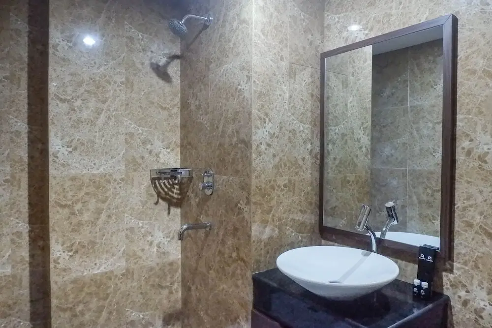 Сурабая: Classy 1BR Apartment with Pool View at Grand Sungkono Lagoon