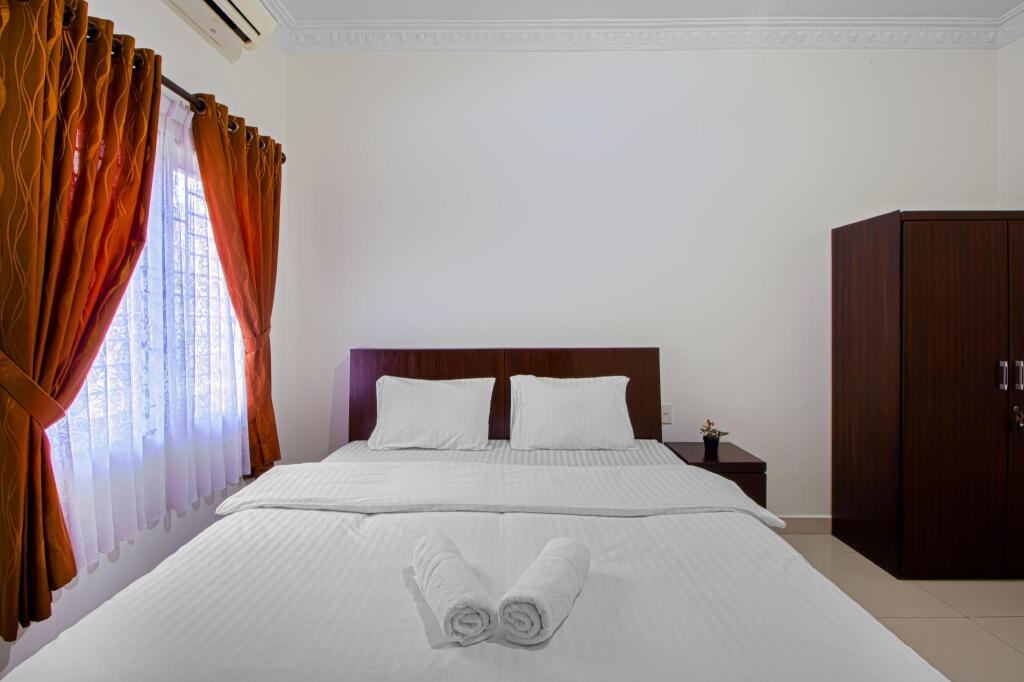 Медан: De Coco Guesthouse