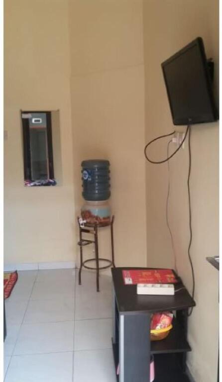 Бату: Rosi Homestay