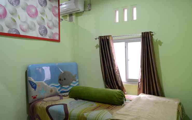 Джамби: Amien Guest House Syariah Redpartner