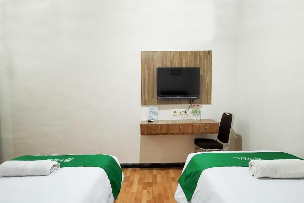 Маланг: OYO 3482 Bima Guest House