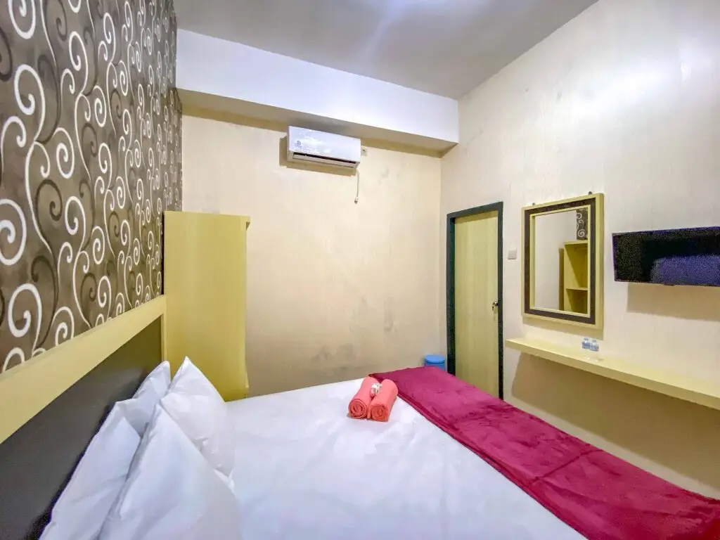 Маланг: Tini's Guest House Malang RedPartner