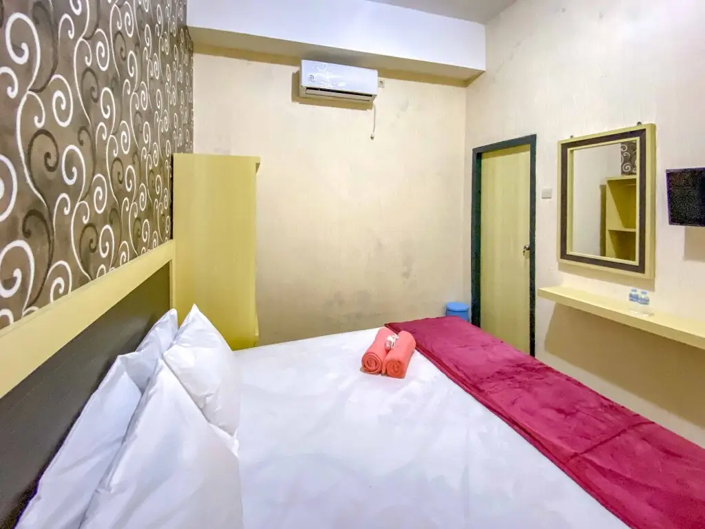 Маланг: Tini's Guest House Malang RedPartner
