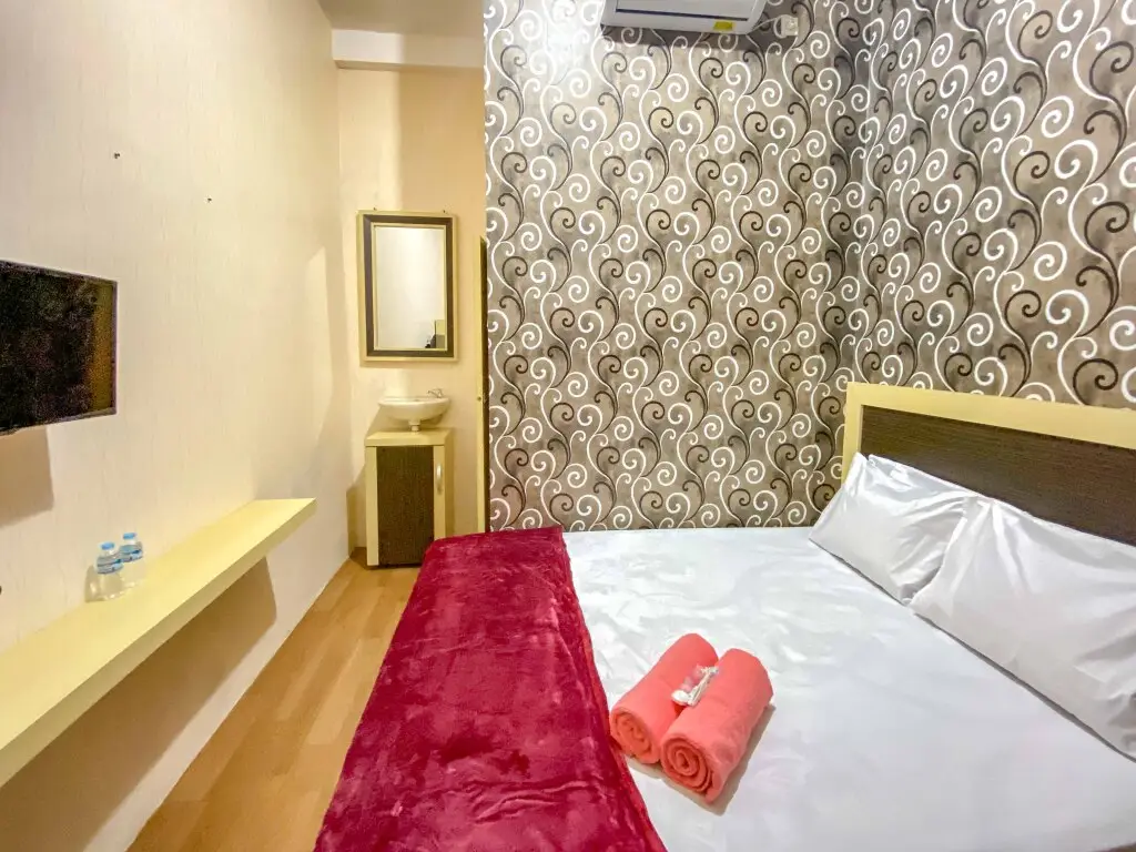 Маланг: Tini's Guest House Malang RedPartner