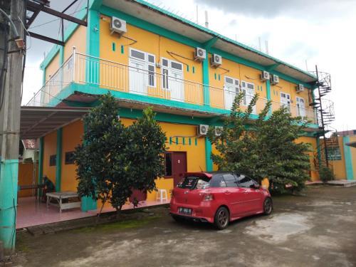 Медан: Kost 748 At