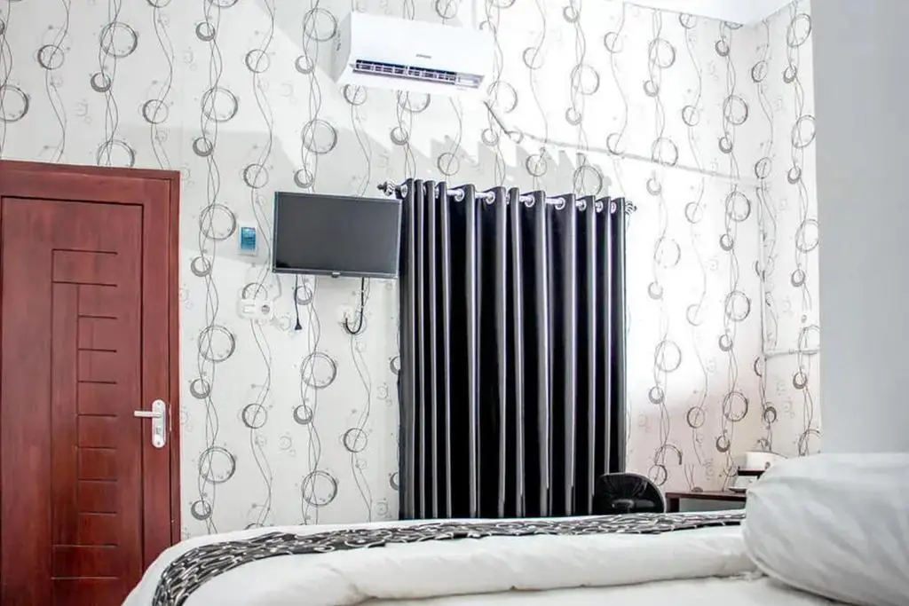 Калипуро: Samar Wulu Guest House Syariah RedPartner