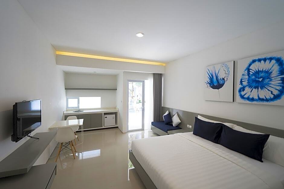 Падангсамбиан: The Rooms Apartment