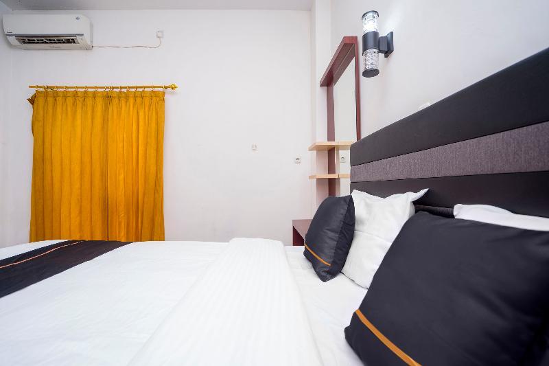 Самаринда: D'Es Guest House