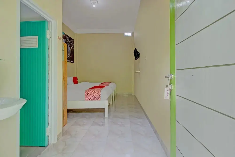 Бандар-Лампунг: Super OYO 3774 Orchid 37 Syariah Guest House