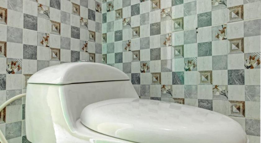 Бандар-Лампунг: Super OYO 3774 Orchid 37 Syariah Guest House