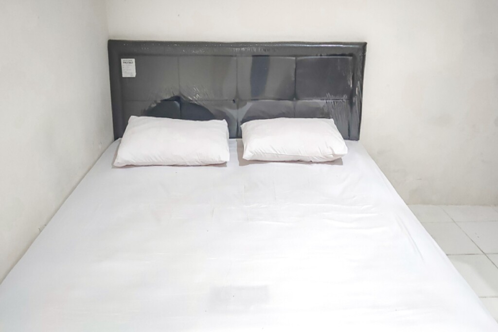 Сурабая: Anugerah Guesthouse RedPartner