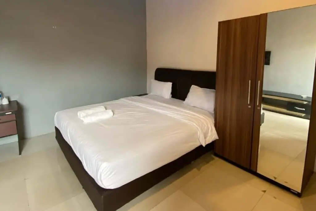 Медан: Djaboerigin Mongonsidi Guest House RedPartner