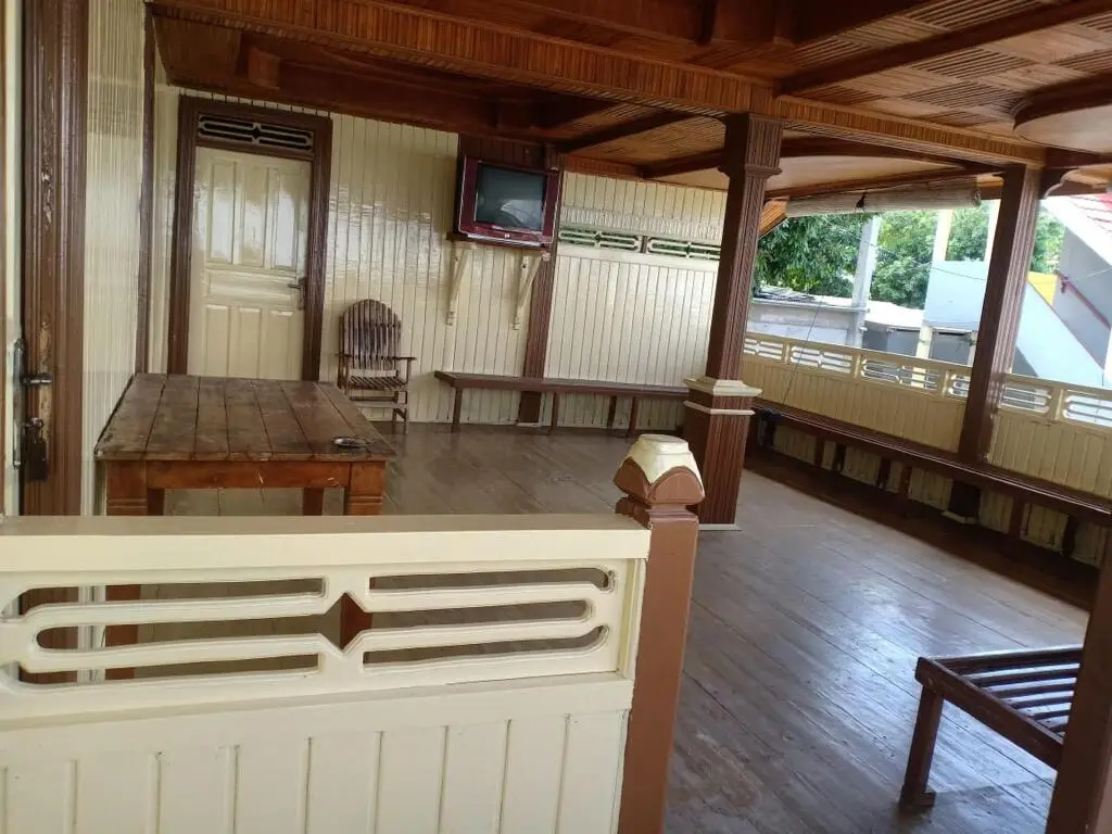 Бира: Wisma Bahari Indah