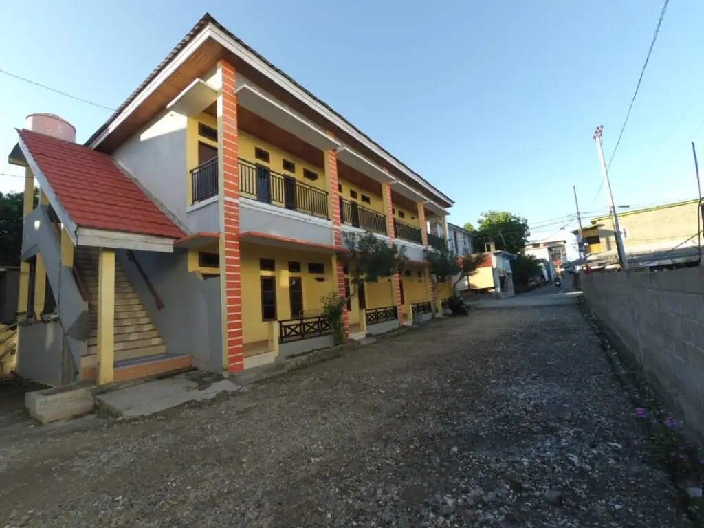 Бира: Wisma Bahari Indah