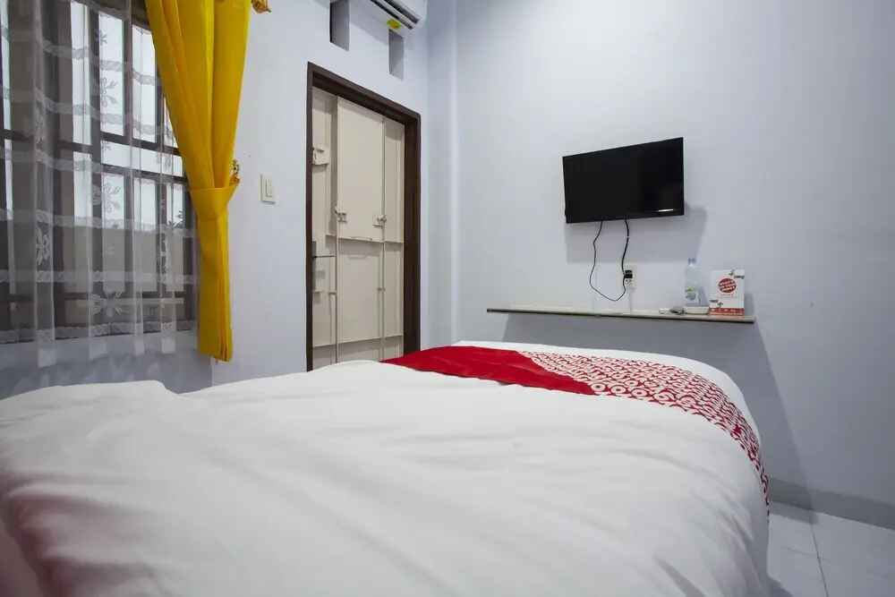 Пематанг Рая: Sopou Penginapan Rinal & Tuah by OYO Rooms