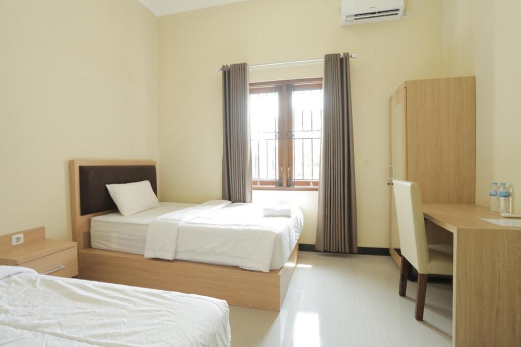 Суракарта: IDR Green Guest House Syariah by Reddoorz