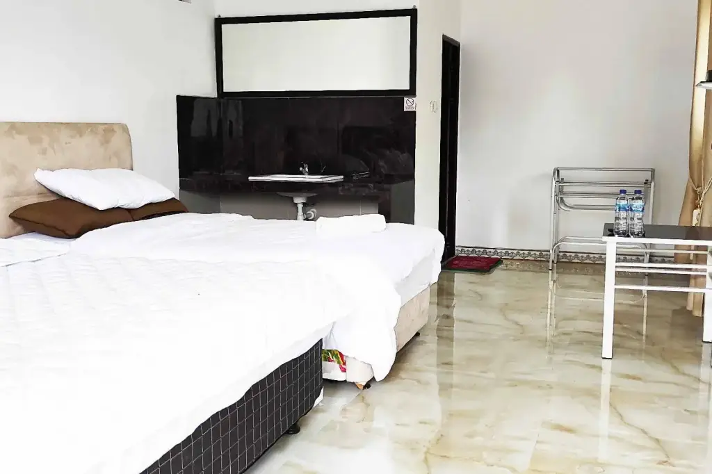 Бату: Pertiwi Guest House