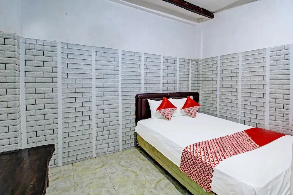 Джомбанг: Coupis Guesthouse by OYO Rooms