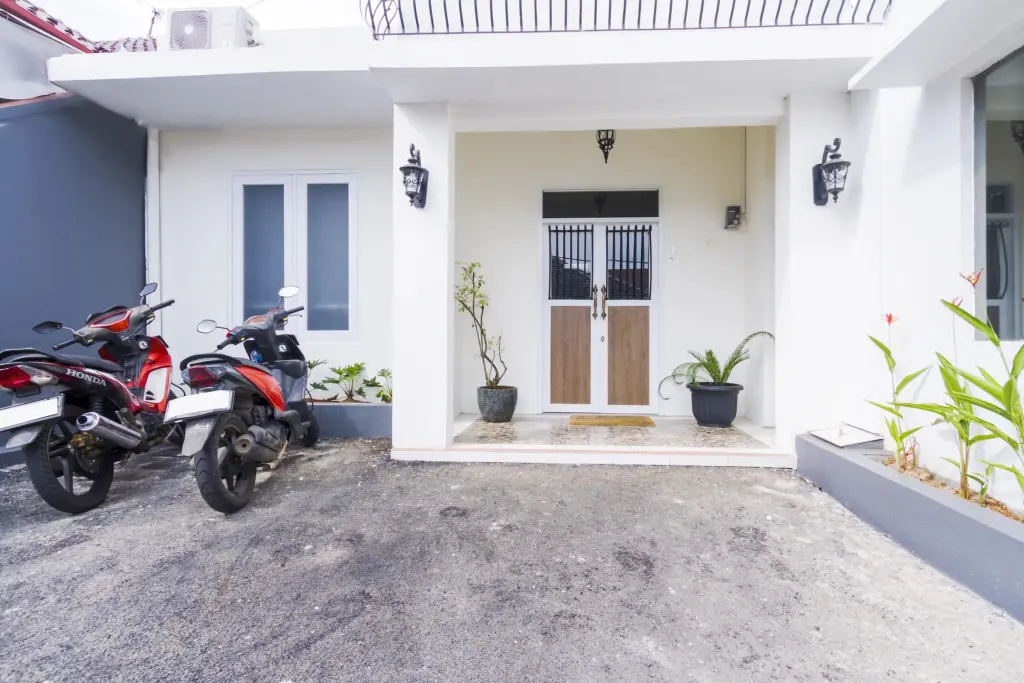 Сиамис: House Of Mahira Syariah by OYO Rooms