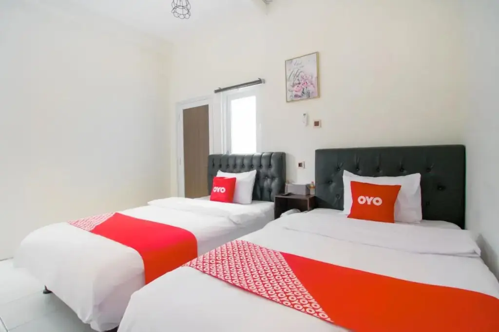 Сиамис: House Of Mahira Syariah by OYO Rooms