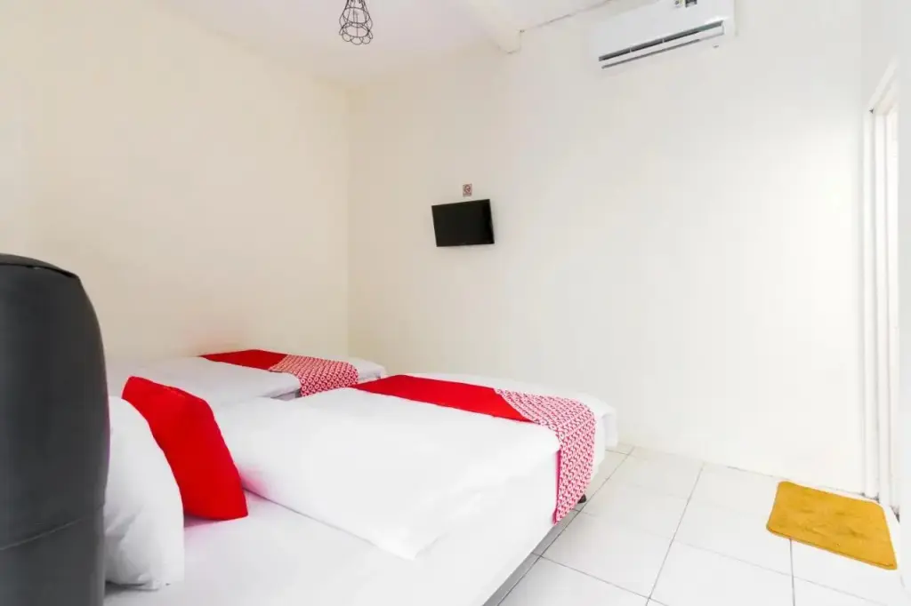 Сиамис: House Of Mahira Syariah by OYO Rooms