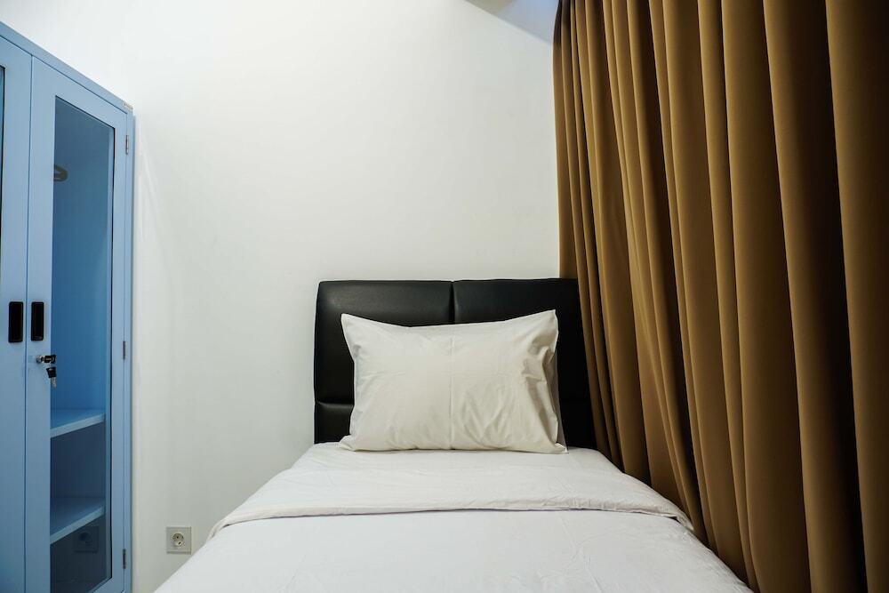 Legok: Minimalist and Warm 2BR M-Town Apartment